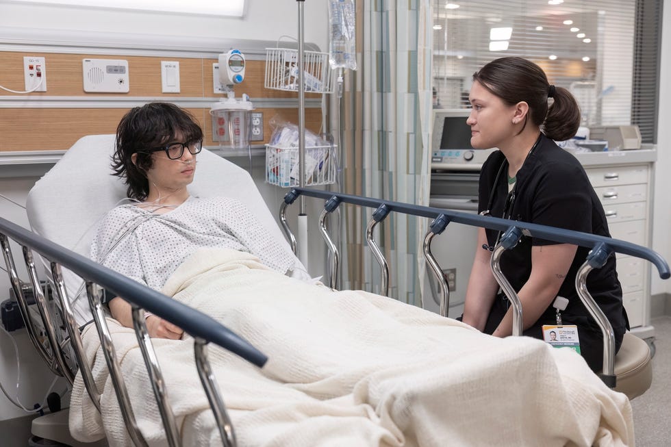 santos check on max and tells him about the friend she lost. (warrick page/max) 