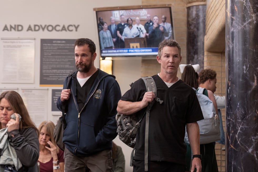 robby and abbott head out the pedestrian entrance to find a packed waiting room. (warrick page/max) 